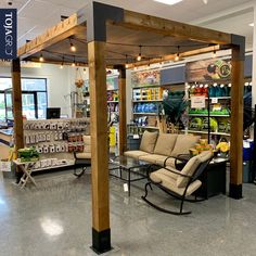 the inside of a store with furniture in it