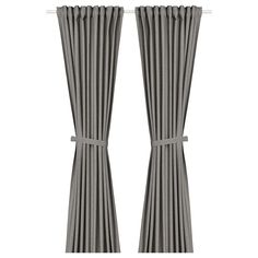 two gray curtains with ties on them