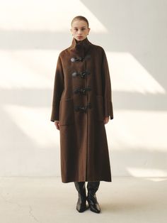 Brown Outerwear With Stand Collar And Buttons, Luxury Brown Wool Coat With Button Closure, Brown Stand Collar Outerwear For Work, Luxury Brown Wool Coat For Fall, Luxury Brown Pea Coat For Winter, Luxury Brown Outerwear With Buttons, Luxury Brown Pea Coat With Button Closure, Luxury Brown Outerwear With Button Cuffs, Brown Wool Coat With Buttons For Fall