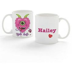 two white coffee mugs with monsters on them, one has the word haley