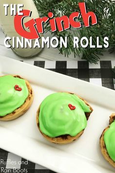 the grin cinnamon rolls are decorated with green icing