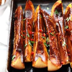 some food is sitting on a tray ready to be cooked in the oven and eaten