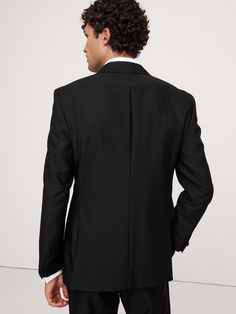 Timeless tailoring, this exquisite black tuxedo jacket offers elevated style to last a lifetime.  Made from Italian virgin wool, our designers employed a classic Barathea weave, a sharp roped shoulder construction and our tailored slim fit for a natural look that's especially polished.  Ottoman pockets finish the look with understated sophistication.  Tailored Slim Fit: Sits at the natural shoulder with an English-style roped shoulder.  Fitted through the chest and waist.  Fabric from Italy's Ma Italian Tuxedo, Black Tuxedo Jacket, Elevated Style, Black Tuxedo, Peak Lapel, Tuxedo Jacket, English Style, Slim Fit, Long Sleeve