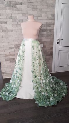 Flower embroidered light green tulle detachable wedding skirt with train - an elegant adding to your wedding gown can be matched with different styles wedding gowns and tops.  Also, the skirt can be ordered in full, with Royal satin underneath skirt, Tulle crinoline and Lining.  Please select all your preferred options and indicate your size at checkout.  Kindly note that this listing is for the skirt presented in the first pictures. In case you are interested to buy one of optional items from t Detachable Wedding Skirt, Wedding Overskirt, Bridal Skirt Separate, Wedding Train, Train Skirt, White Flower Wedding, Unreal Unearth, Bridal Skirt, Wedding Cloak