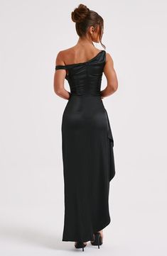 Timeless, glamorous and super romantic, the Juliene maxi is this season's showstopper. Cut from our sumptuous bias cut satin which cinches the figure but also drapes beautifully, this design features a built in corset to snatch the waist, an asymmetric neckline and gathered detailing with a thigh high split. An elegant drape detail falls from one side to make this dress feel super elevated and special. 



Colour: Black.

Luxury bias cut satin without stretch.

Asymmetric straps.

Built in corse Fitted Maxi Dress With Satin Finish For Evening, Fitted Satin Dress With Ruched Bodice And Maxi Length, Pre-draped Satin Maxi Dress, Pre-draped Maxi Dress For Prom Evening, Satin Maxi Dress With Fitted Bodice For Night Out, Fitted Satin Finish Maxi Dress For Gala, Satin Finish Fitted Maxi Evening Dress, Satin Maxi Dress With Fitted Bodice, Draped Satin Evening Dress With Satin Finish