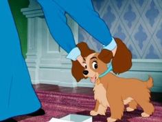 lady and the tramp is standing in front of a box