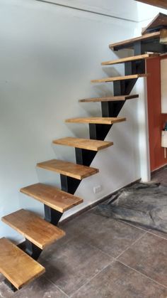 a set of stairs made out of wood and metal