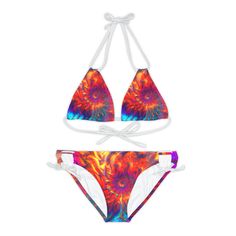 Elevate your summer style with this trendy Women's Strappy Bikini Set, perfectly suited for festival clothing and rave outfits. This bikini set features a unique blend of 82% microfiber polyester and 18% spandex, offering a comfortable 4-way stretch and medium fabric weight. Adjustable elastic straps and removable pads ensure the perfect fit and preferred support. Choose from 7 vibrant colors to reflect your unique style and celebrate your beauty. Take your pool days and festival outfits to the Multicolor Tie-side Bottom Swimwear For Beach, Festival Bra Friendly Tie-side Swimwear, Multicolor Tie-side Swimming Bottoms, Summer Multicolor Tie-side Swimwear Bottom, Tank Top Swimsuit, Multicolor Tie-side Bottom Swimwear With Drawstring, Puffer Jacket Men, Rave Gear, Racerback Dress