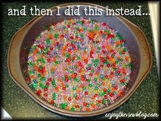 a bowl filled with lots of different colored sprinkles