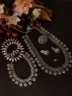 Celebrate your Navratri with this double necklace ful combo set This beautiful set of 6 has a big long Haram oxidized necklace with a choker silver necklace, pair of jhumka earrings, a ring,pair of bangles, and a nose pin. Grab this beautiful set with any of the ethnic/ Indo western outfit and look Silver Long Necklace, Long Necklace Set, Oxidised Silver Jewelry, Temple Jewelry, Oxidized Necklace, Double Necklace, Long Silver Necklace, Silver Jewelry Fashion, Pretty Necklaces