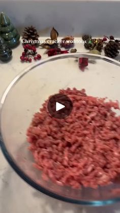 the ground beef is being cooked in a bowl