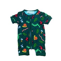 Introduce your little one to a world of tiny creatures with our Bugs Life Short Romper. Covered in playful bugs, including caterpillars and snails, this romper is perfect for boys who love nature. Made from soft fabric, it's cozy and environmentally-friendly. Casual Cartoon Print Jumpsuits And Rompers For Playtime, Cotton Onesie With Dinosaur Print For Playtime, Casual Printed Onesie For Playtime, Green Playful Onesie For Loungewear, Playful Green Onesie For Loungewear, Playful Printed Onesie For Playtime, Playful Dinosaur Print Onesie For Playwear, Playful Green Cotton Jumpsuits And Rompers, Playful Green Cotton Onesie