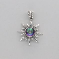 This is a beautiful MYSTIC TOPAZ Pendant in 925 Sterling Silver. The metal is solid silver without any nickel or other substances causing most allergies making the jewelry hypo allergenic. Size of the Pendant (in total incl. Bail)   3.7 x 2.7 cm or 1.46 x 1.06 inch Please note: Our jewelry is photographed close up to show detail and may appear larger than they are. We are happy to help with any questions. We use a dime coin as size reference on one of the pictures. You will receive the item in a Celestial Star-shaped Silver Jewelry, Hypoallergenic Sterling Silver Iridescent Jewelry, Hypoallergenic Iridescent Sterling Silver Jewelry, Shiny Sterling Silver Jewelry, Sterling Silver Shiny Jewelry, Sterling Silver Shiny Finish Jewelry, Iridescent Sterling Silver Round Jewelry, Iridescent Sterling Silver Spiritual Jewelry, Iridescent Round Sterling Silver Jewelry