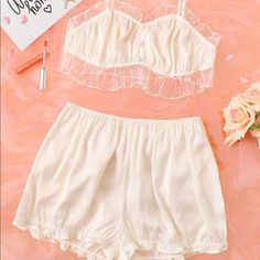 Mesh Trimmed Night Set With Ruffle Hem In Cream Colored Satin. The Bra Top Has Adorable Button Details, And The Shorts Are High Waisted And Super Flattering. Brand New ! Never Worn ! Size M Bust: 30.7-52 “ Waist: 26.8-47.2 “ Hip: 48 Bra Top Length: 12.2 “ Shorts Length: 12.3 “ White Sheer Sleepwear For Sleepovers, White Lace Trim Pajama Shorts For Sleep, Lingerie Gown, Green Lingerie, Night Set, Floral Lingerie, Holloween Costume, Pink Corset, Pajama Dress