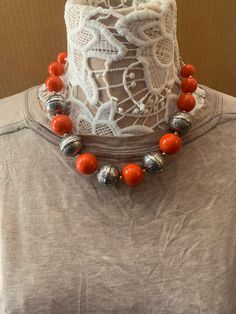 Paparazzi orange and silver necklace Orange Jewelry With Silver Beads As A Gift, Orange Jewelry With Silver Beads For Gift, Bohemian Orange Necklaces With Silver Beads, Orange Beaded Round Necklace, Adjustable Round Orange Necklace, Elegant Long Orange Necklace, Orange Round Beads Costume Jewelry, Orange Round Jewelry With Large Beads, Bohemian Orange Necklace