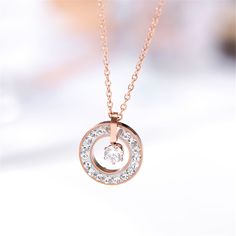 Elevate your ensemble with the timeless glow of this pendant necklace plated with romantic rose gold. Sparkling cubic zirconia embellishments increase the splendor. ?Chain: 17.72'' L Pendant: 0.55'' W x 0.67'' L Lobster claw clasp 18k rose gold-plated titanium steel / cubic zirconia Rose Gold Plated Ring, Romantic Roses, Ring Pendant, Ring Pendant Necklace, Gold Plated Rings, 18k Rose Gold, Rose Gold Plates, Washer Necklace, Cubic Zirconia