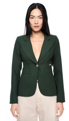 Style Notes: This blazer is quintessentially SMYTHE: refined and perfectly tailored. This timeless classic has been a SMYTHE staple since 2011.Details: Decidedly tailored and one of our top selling silhouettes, this single-breasted blazer features a “cheeky” cut out back vent and brass hardware. Curvy figures may wish to go up a size.Color: ForestSize: Model is 5'11" and is wearing a size 2. Please use the Size Guide to determine your size.Content + Care: 100% Wool. Lining: 100% Cupro Rayon. Dry Classic Fitted Tweed Jacket, Classic Tailored Tweed Jacket With Pressed Crease, Elegant Notched Blazer With Double Button Closure, Classic Structured Office Sport Coat, Timeless Fitted Blazer, Luxury Fitted Tweed Jacket With Suit Collar, Timeless Blazer With Lapel Collar And Hidden Button Closure, Fitted Single Button Tweed Jacket With Lapel Collar, Elegant Sport Coat With Double Button Closure