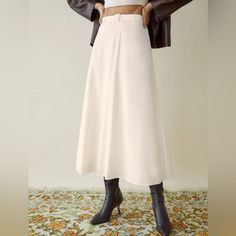 This Belted Skirt Is A Timeless Treasure. Brand New W/Out Tag *Midi Silhouette *Side Zip *Lined *Removable Belt *Ecovero Viscose, Organic Cotton; Organic Cotton Lining *Machine Wash Cold Gentle *Imported Color: Off White-White Approximate Waist: 16" Approximate Length: 36" Inquire About Additional Measurements Due To The Nature Of The Material, Skirt May Arrive Wrinkled Product Label Is Marked To Prevent Retail Store Return. Feminine Long Skirt For Workwear, Feminine Long Skirt For Work, Feminine Beige Midi-length Bottoms, White Feminine Midi-length Bottoms, Feminine Beige Midi Bottoms, Feminine White Midi-length Bottoms, White Feminine Midi Length Bottoms, White Full Skirt For Workwear, White Relaxed Skirt Bottoms For Fall