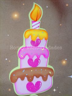 a birthday cake with candles and hearts on it