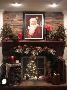 a mantel decorated with christmas decorations and candles