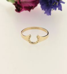 Solid 9ct Yellow Gold Horseshoe Band Ring Metal - Genuine 9ct yellow gold, British Hallmarked Sizes - UK H to R, USA 4 to 8.5 Made in England. Presented in a quality branded eco-friendly ring gift box 100% Quality Guaranteed See what our customers are saying about their jewellery made by Stephen Knapper! https://www.etsy.com/uk/shop/StephenKnapper?ref=seller-platform-mcnav#reviews To see more of our jewellery visit our store https://www.etsy.com/uk/shop/StephenKnapper About us At Stephen Knapper, we are passionate about making jewellery for you, and we take great pride in crafting high quality, ethically made jewellery. Stephen has been making jewellery now for 24 years at our workshop in Staffordshire England. The jewellery is made using traditional methods with responsibly sourced materi 14k Gold Horseshoe Ring, Ring Gift Box, Horseshoe Ring, Jewelry Real, Making Jewellery, Lucky Horseshoe, Gold And Silver Rings, Gifts For Horse Lovers, Ring Metal