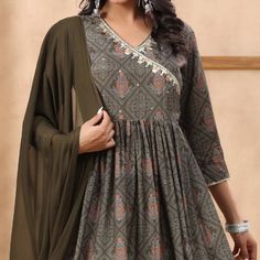 Grey colored suit is prettified with Jaipuri and sequins work as shown which makes it appear classy. This top is made of muslin fabric which is accompanied with santoon bottom and chiffon dupatta. Women can buy this suit to wear for their parties and functions. Note:- The actual product may differ slightly in color and design from the one illustrated in the images when compared with computer or mobile screen. Size Chart Size: Semi Stitched/Unstitched can be altered from maximum to minimum size b Festive Mirror Work Mulmul Palazzo Set, Festive Mulmul Palazzo Set With Mirror Work, Festive Mulmul Anarkali Set With Mirror Work, Elegant Cotton Sharara With Mirror Work, Transitional Georgette Salwar Kameez With Printed Motifs, Festive Anarkali Set With Printed Motifs In Georgette, Festive Anarkali Set In Georgette With Printed Motifs, Elegant Cotton Anarkali Set With Cutdana, Navratri Mulmul Anarkali Set With Mirror Work