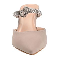 This slip-on stiletto with a rhinestone-covered strap is sure to become the focus of the room. The Lunna heels by Journee Collection are crafted with supple vegan leather and a padded insole. A sassy pointed-toe finishes this slip-on mule for an effortlessly chic finish. Closure Type: Slip-OnShoe Heel Height: 3 InchesUpper/Outer Base Material: 100% PolyuretheneShoe Lining Material: PolyurethaneSole Material Content: 100% PolyurethaneToe Type: Pointed Toe, Closed ToeCare: Spot CleanHeel Style: St Beige Heels For Events, Beige Heels For Event, Chic Synthetic Heels For Events, Chic Slip-on Block Heel Heels, Beige High Heel Mules For Evening, Elegant Beige Synthetic Mules, Elegant Slip-on Block Heel Mules, Elegant Slip-on Mules With Block Heel, Chic Slip-on Heels With Block Heel