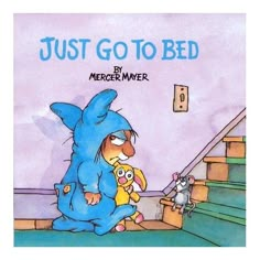 a book cover for just go to bed with an image of a blue bunny holding a stuffed animal