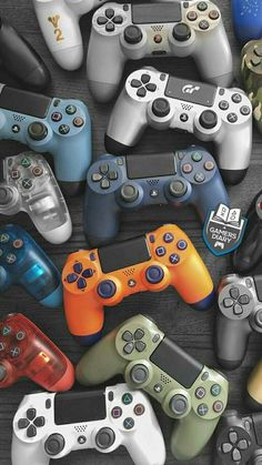 many different colored video game controllers on display