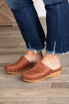 Product Details Colors: Whisky, Silver Print: Solid with Studs Heel: 2" Other Details: Slip On Clogs Brand: Corkys Size and Fit True to Size Studded Heels, Knit Denim, Swimsuit Shops, Outerwear Outfit, Mule Clogs, Long Sleeve Cardigan, Hat Hairstyles, Long Sleeve Maxi Dress, Clogs