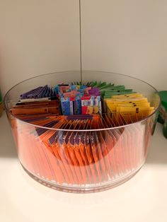 a bowl filled with lots of different colored candy