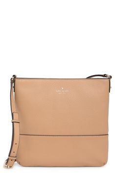 Go hands-free with this pebbled leather crossbody bag featuring a roomy interior for your daily essentials. 10.1" H x 10.1" W x 1.2" D 22" strap drop Top zip closure Exterior with foil embossed logo Interior with spade jacquard lining; wall slip pockets; wall zip pocket Leather exterior/textile lining Imported Classic Pebbled Crossbody Shoulder Bag, Classic Crossbody Shoulder Bag With Pebbled Texture, Beige Pebbled Texture Bag For Everyday Use, Everyday Use Crossbody Bag With Pebbled Texture, Everyday Pebbled Texture Crossbody Shoulder Bag, Pebbled Texture Crossbody Bag For Everyday Use, Everyday Pebbled Texture Crossbody Bag, Beige Pebbled Leather Crossbody Shoulder Bag, Pebbled Leather Crossbody Bag