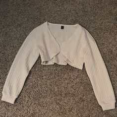 Never Worn White Shrug For Spring Layering, Cute White Crew Neck Cardigan, Casual White Shrug For Fall, Cheap White Long Sleeve Cardigan, Casual White Fall Shrug, Beige Cropped Cardigan For Spring, White Long Sleeve Shrug For Fall, White Long Sleeve Shrug For Spring, Beige Long Sleeve Shrug For Fall