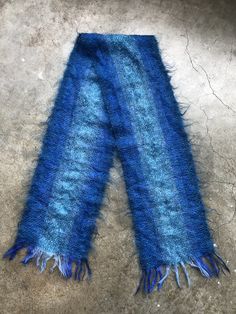 "Excellent condition. Beautiful deep blue colors. Semi sheer mohair weave. Light, floaty, soft, and hairy. Approx 9.25\" x 66\" (including fringe)." Blue Mohair Sweater, Winter Mohair Scarves, Blue Hand Knitted Scarf, Handmade Blue Yarn Scarf, Handwoven Rayon Chenille Scarf Blue, Teal Ombre, Blue Bohemian Hand-dyed Silk Scarf, Italy Fashion, Vintage Soft