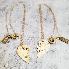 This is a perfect Valentine's day gift for your favorite person! These are TWO beautiful and shiny broken heart necklaces - one is for you, obvi.  They are hand stamped as one heart with PARTNERS IN CRIME in uppercase as pictured or any phrase around 15 characters. When the necklaces are apart, the message on the full necklace isn't clear - which is great for those of us that love to laugh at ourselves.It's the perfect way to celebrate Galentine's day with your girl gang bestie who would totally Personalized Jewelry For Best Friend Gift, Customized Jewelry For Valentine's Day Friendship, Hand Stamped Heart Jewelry For Friendship, Customized Jewelry For Friendship On Valentine's Day, Meaningful Jewelry For Best Friend Gift On Valentine's Day, Personalized Meaningful Charm Necklaces For Friendship, Heart Shaped Charm Necklace For Best Friend, Friendship Heart Charm Necklaces For Mother's Day, Heart Charm Necklaces For Friendship And Mother's Day