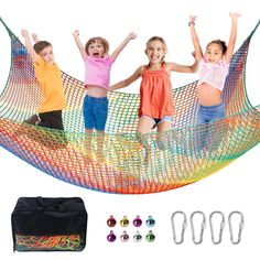 three children are standing in a hammock with their arms up and hands out