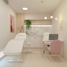 a room with a desk, chair and laptop on the floor next to a sink