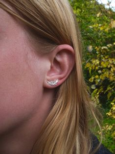 Our tiny studs earrings feature a cascade of olive leaves that are inspired by a love of nature and peace. The olive branch has been worldwide symbol of peace since ancient times. You might never want to take off these comfy little earrings! • Tiny Leaf Studs Earrings. • Each leaf branch measures 14mm long x 5mm wide. • sterling silver or 14K gold plated backings included. • One pair of earrings. OPTIONS: 1. Solid sterling silver. Nickel Free. 2. 14K Gold Plated Brass. The Olive Branch, Jewelry Giveaway, Little Earrings, Olive Leaves, Branch Earrings, Symbol Of Peace, Mother Of Pearl Earrings, Big Hoop Earrings, Tiny Studs