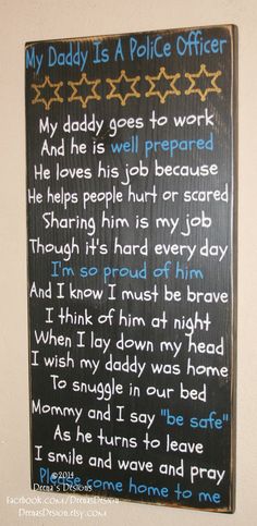 a wooden sign that says, my daddy is a police officer and he has to work