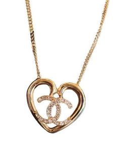 Free eBay listing template designed by dewiso.com Chanel 23C Heart Gold Necklace with Crystals on the CC This is your chance to get this fascinating Chanel necklace at such an incredible price!! A chanel jewelry is always so classic, an investment piece that seems to increase with time and is highly sought after, making this the ultimate jewelry all fashionistas love to have in their closet!! Especially made with the finest quality, the sparkle and the craftsmanship is just different and gorgeou Luxury Heart Pendant Necklace, Luxury Rose Gold Heart Necklace, Luxury Double Heart Necklace, Luxury Double Heart Necklaces For Formal Occasions, Luxury Double Heart Jewelry For Formal Occasions, Elegant Double Heart Necklace With 17 Jewels, Luxury Heart Necklace With Diamond Accents, Luxury Open Heart Necklace, Classic Double Heart Jewelry For Formal Occasions