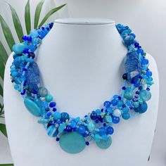 Big bold chunky multi strand handmade necklace. Turquoise  beaded statement jewelry gift for women. You can wear this unique Turquoise  gemstone jewelry day or evening. Fits perfectly into shirts or summer dresses This necklace can make even an everyday dress stunning. It will be the perfect gift for yourself and a wonderful woman around you. While designing my necklaces, I pay attention to multi-purpose use. It can be used for casual evening or wedding, it's up to you and your choices .  For wi Blue Multi-strand Gemstone Beaded Necklace, Handmade Turquoise Bib Necklace With Round Beads, Turquoise Bib Necklace With Round Beads For Gifts, Handmade Multi-strand Turquoise Beaded Necklaces, Unique Multi-strand Turquoise Necklace Gift, Handmade Turquoise Multi-strand Necklaces, Evening Fits, Bold Statement Necklaces, Necklace Big