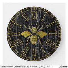 a black and yellow clock with a bee on it's face that says, gold bees color by wrapped - too - tight