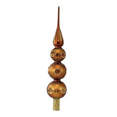 a tall wooden pole with three balls on it's top and one ball at the bottom