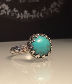 Turquoise ring. Natural Turquoise and a Solid Silver Ring. Artisan turquoise and Sterling silver crown ring. Renaissance Ring. Gift for her. This stunning solid silver and kingman turquoise ring is a size 7 but is available in any size with a very similar stone stone in 3 days. The beautiful natural turquoise stone measures just under 1/4 of an inch or 12mm. This unique yet very versatile ring is sure to be your new go to accessory or makes the perfect gift. ❤️❤️Comes in a Jewelriart Gift box. G Bohemian Blue Turquoise Ring, Bohemian Blue Turquoise Gemstone Ring, Bohemian Blue Turquoise Ring With Gemstone, Bohemian Turquoise Ring With Gemstone, Artisan Turquoise Opal Ring, Artisan Handmade Turquoise Wedding Ring, Turquoise Vintage Promise Ring, Artisan Handmade Turquoise Ring For Wedding, Bohemian Blue Turquoise Ring With Natural Stones