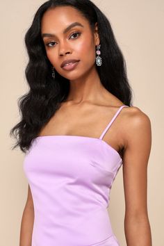 You'll be the chicest cutie on the dance floor with a luxe look like the Lulus Ideal Perfection Lavender Satin Sleeveless Mini Dress! Sleek woven satin shapes this flirty lil' dress that features a sleeveless darted bodice and a simple straight neckline, all supported by adjustable spaghetti straps. The figure-skimming, bodycon silhouette features flattering pleated detailing at the side and finishes at a cute mini hem. Hidden back zipper/clasp. Fit: This garment fits true to size. Length: Mid-t Sleeveless Satin Dress For Prom Season Night Out, Glamorous Fitted Sleeveless Satin Dress, Fitted Sleeveless Satin Dress For Homecoming, Glamorous Sleeveless Satin Dress For Party Season, Sleeveless Slip Dress For Prom, Spring Party Slip Dress With Square Neck, Lavender Homecoming Dresses For Summer, Chic Square Neck Slip Dress For Party, Chic Square-neck Party Slip Dress