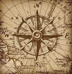 an old map with a compass on it, and the words's names below