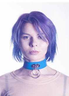 "High quality, durable, choker collar made in bright gloss blue opaque PVC.  This color is super fun and unique!  Decorative double o-ring in front.  Fit is adjustable with buckle.  Silver-toned nickel plated steel hardware. Collar is 1.5\" wide. Please allow 1-2 weeks for construction - These collars are made to order by hand! Model:  Miss Angvik" Trendy Adjustable Blue Choker, Blue Choker For Party, Vinyl Fashion, Rave Babe, Blue Choker, Choker Collar Necklace, Ring Der O, Steampunk Clothing, Hand Model