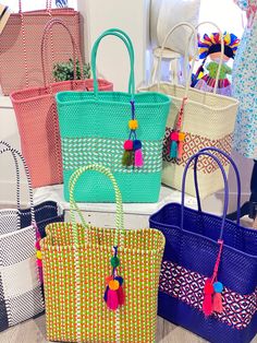 Our handwoven plastic totes are 100% handmade in Oaxaca, Mexico using a resistant recycled plastic line.  Each purse has unique colors, patterns and double straps. These totes are rinsable and bendable. They make the perfect weekender bag, Beach bag, Book bag, Market bag or for everyday use. MEASUREMENTS: Length: 17 inches Height: 17.5 inches Width: 8 inches Drop length: 12.5 pairs inches *Measurements do not include straps* Green Rectangular Straw Bag For Market, Green Woven Crochet Rectangular Bag, Green Rectangular Woven Crochet Bag, Green Handwoven Square Straw Bag, Green Square Handwoven Straw Bag, Green Handwoven Square Bag, Green Rectangular Handwoven Crochet Bag, Green Square Handwoven Bag, Green Woven Beach Bag