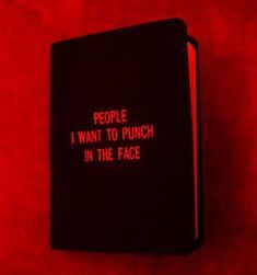 a red book with the words people i want to punch in the face on it