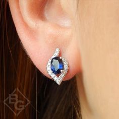 Add a dramatic splash of color and sparkle to your ensemble with these 1.29 carats total weight sapphire and diamond earrings. Brilliant 0.22 carats pavé diamonds set in 14 white gold form a modified pear shaped halo around regal oval cut sapphires. Also available in 14K or 18K white, rose or yellow gold as well as palladium and platinum. Includes earring box Includes jewelry appraisal Ships fully insured to point of delivery Free shipping on this item All orders placed out of NY state (ordered Gabriel Jewelry, Sapphire And Diamond Earrings, Diamond Cluster Earrings, Halo Design, Earring Box, Jewelry Appraisal, Fancy Jewelry, Womens Wedding Bands, Cluster Earrings